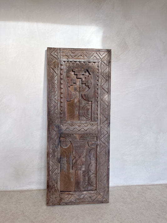 Carved wood wall hanging