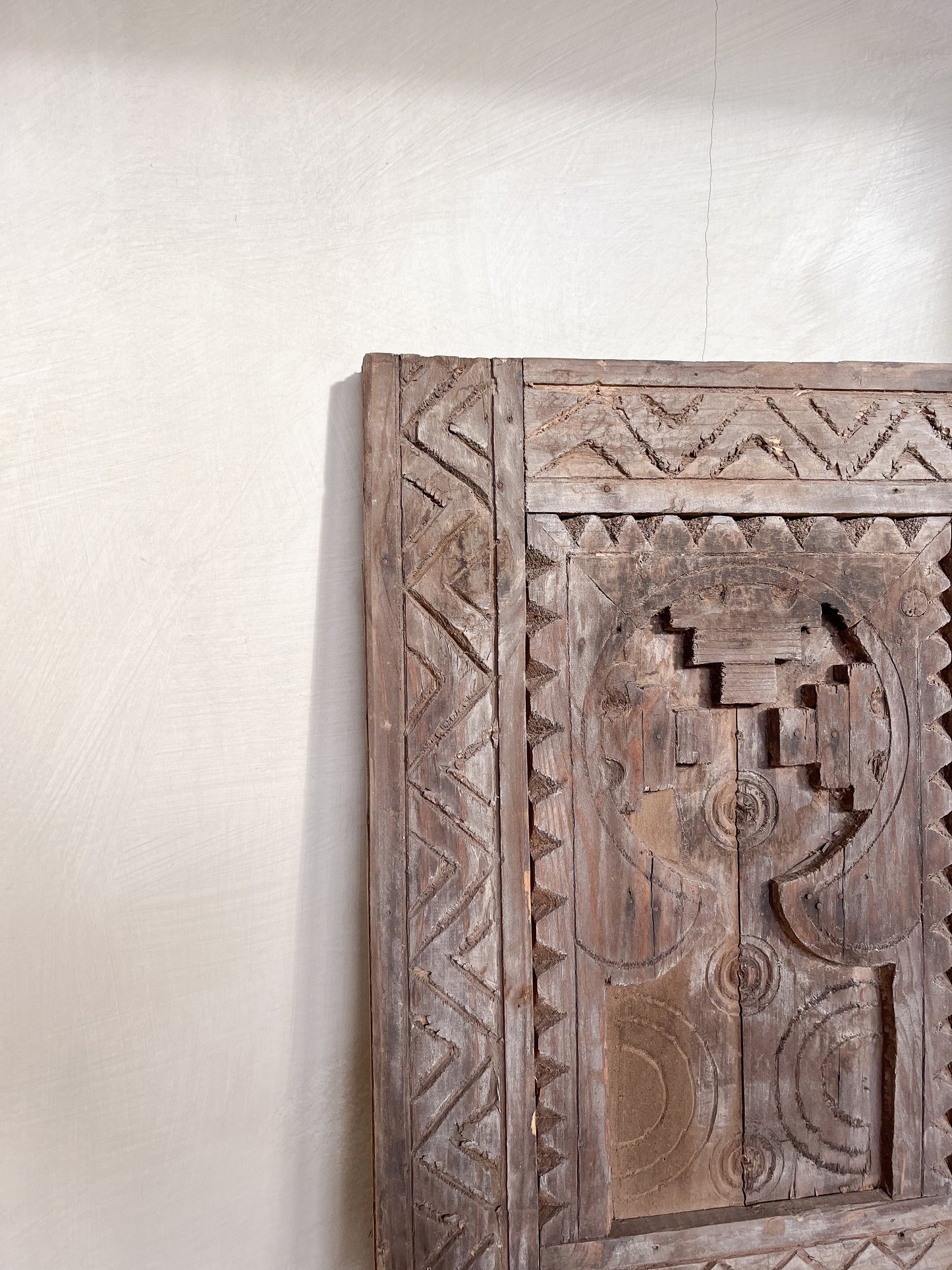 Carved wood wall hanging